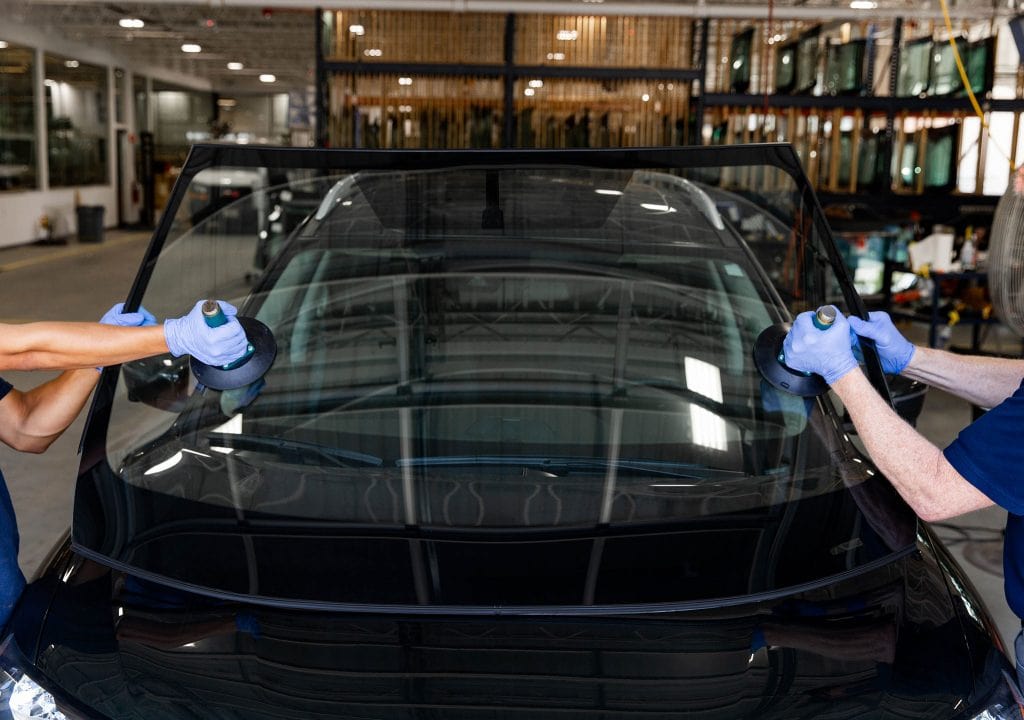 Windshield replacement in progress